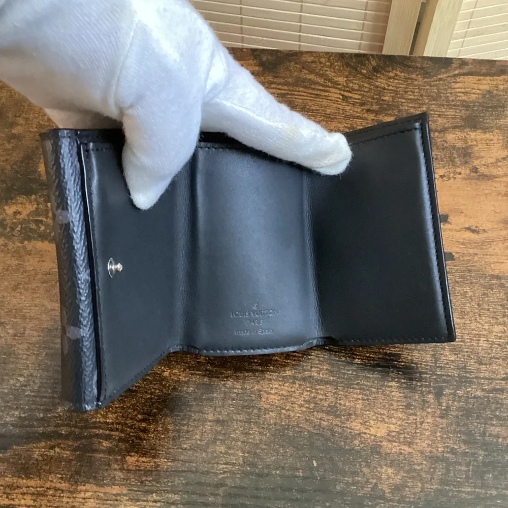 LV Discovery compact wallet Eclipse monogram tri fold